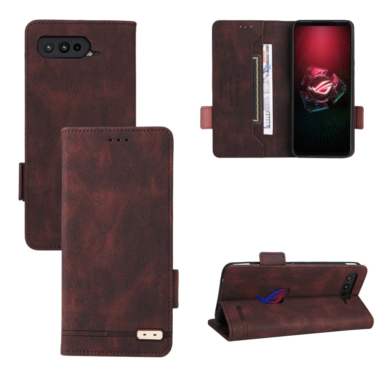 Brown leather phone case folio with magnetic clasp, card pocket, and camera cutouts