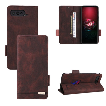 Brown leather phone case folio with magnetic clasp, card pocket, and camera cutouts