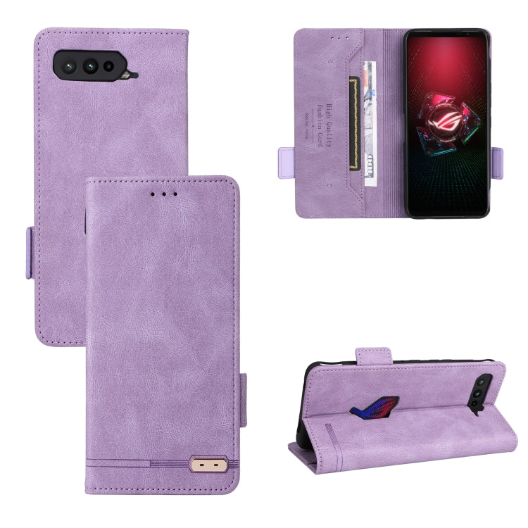 Purple leather phone case with magnetic clasp, front cover pocket, and camera cutout