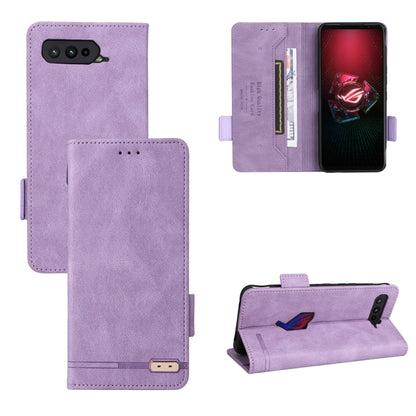 Purple leather phone case with magnetic clasp, front cover pocket, and camera cutout
