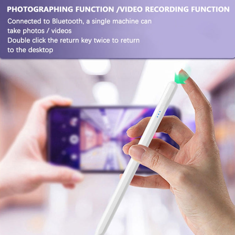 Universal active capacitive stylus pen held in hand above a tablet screen