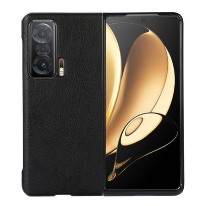 Black litchi-textured phone case with black edge trim, triple-camera cutout and raised lip