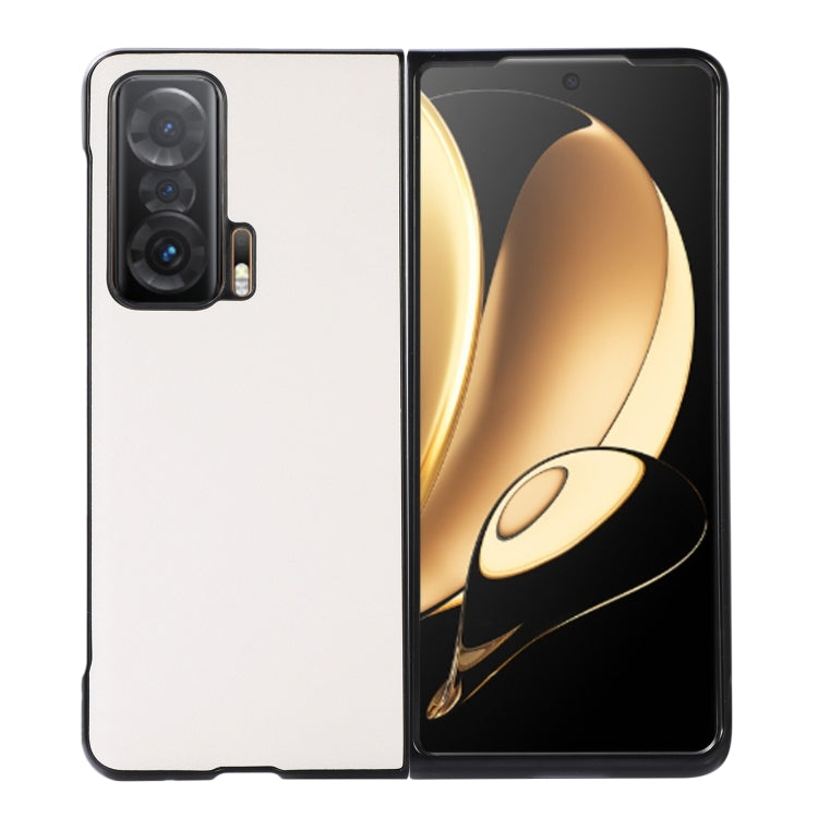 Two-tone phone case with white back and black frame, triple-camera cutout and raised edges