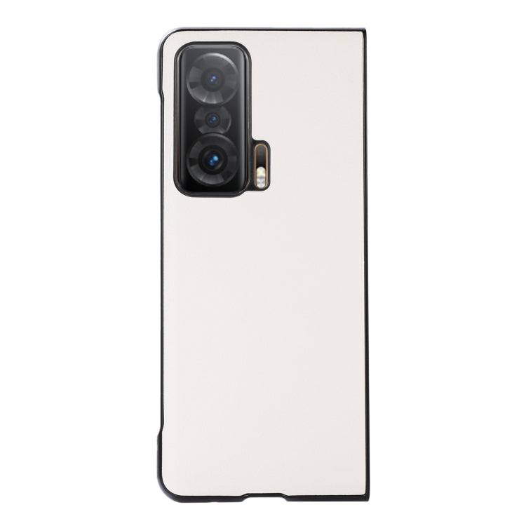 White phone case with black edge trim, triple-camera cutout and raised lip