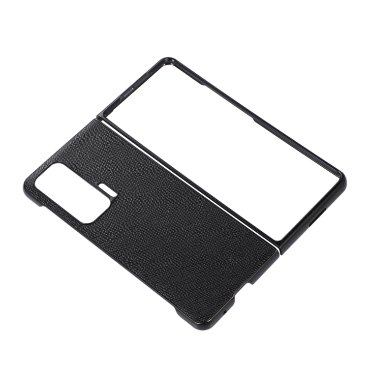 Textured leather phone case with raised edges and cutout for camera and flash