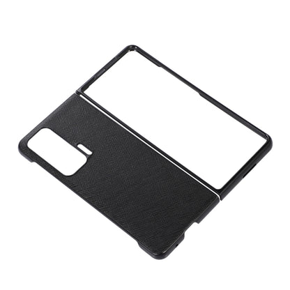 Textured leather phone case with raised edges and cutout for camera and flash