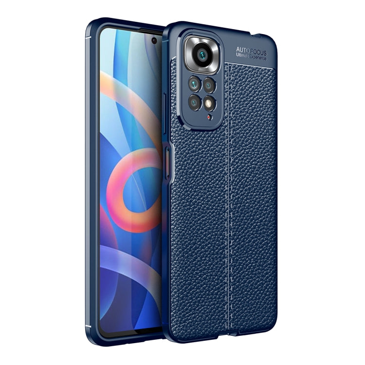Blue TPU phone case with litchi-textured back and raised camera lens openings
