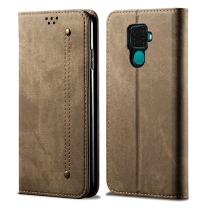 Khaki denim-textured leather flip phone case with side camera cutout and teal accent