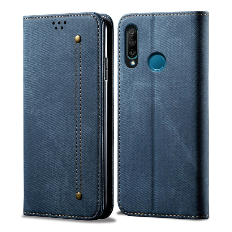 Blue denim-textured leather flip phone case with key-ring style hole and camera cutout