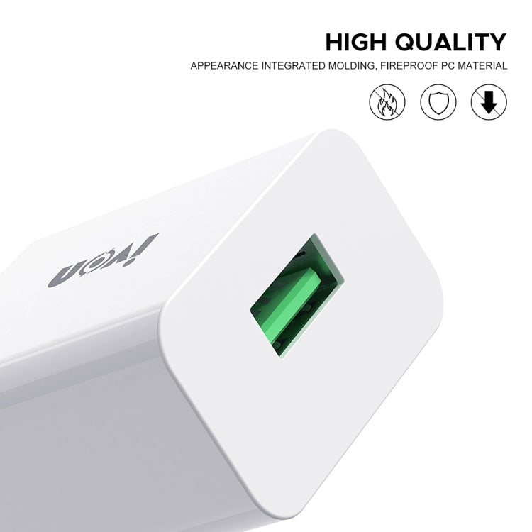 White USB travel charger with visible green-lit port opening