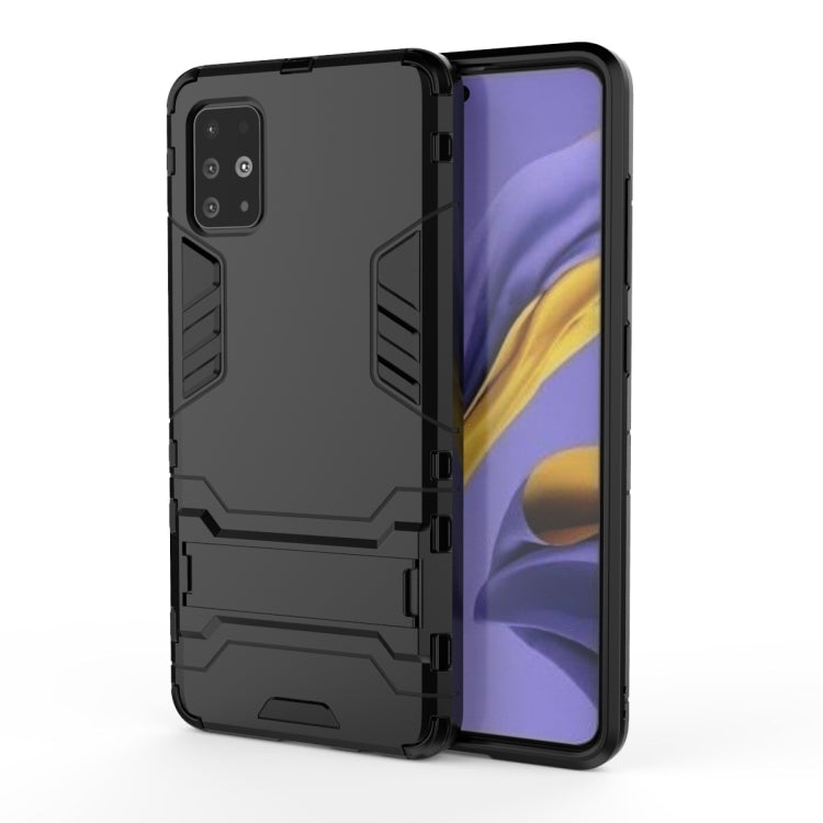 Dark gray shockproof phone case with TPU bumper and camera cutout on purple phone