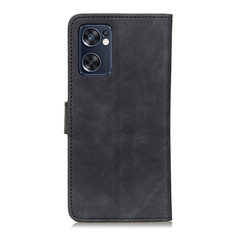 Black textured leather flip phone case with camera cutout and stitched seams