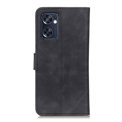 Black textured leather flip phone case with camera cutout and stitched seams