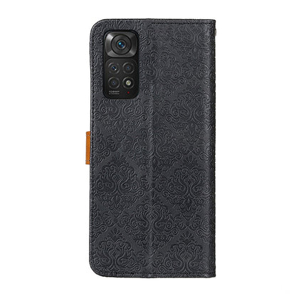 Black embossed leather phone case with camera cutouts and tan side strap