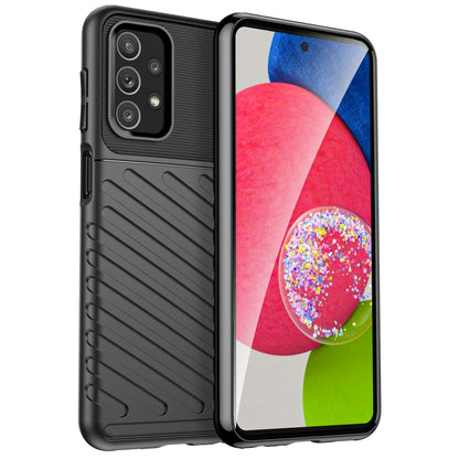 Black rugged TPU phone case with raised camera protection and side button cutouts