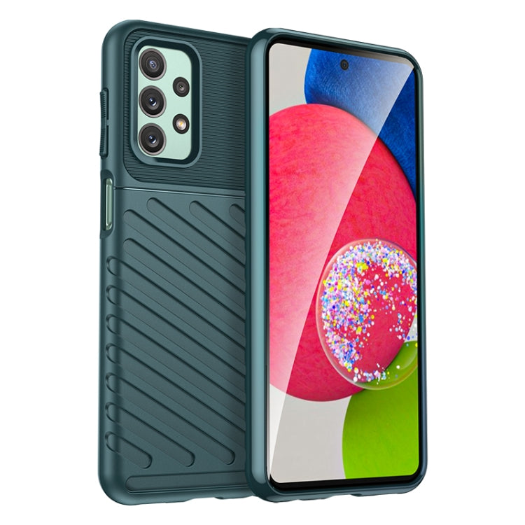 Green rugged TPU phone case with raised camera protection and side button cutouts