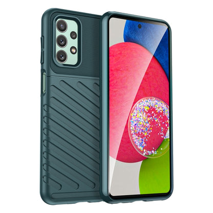 Green rugged TPU phone case with raised camera protection and side button cutouts