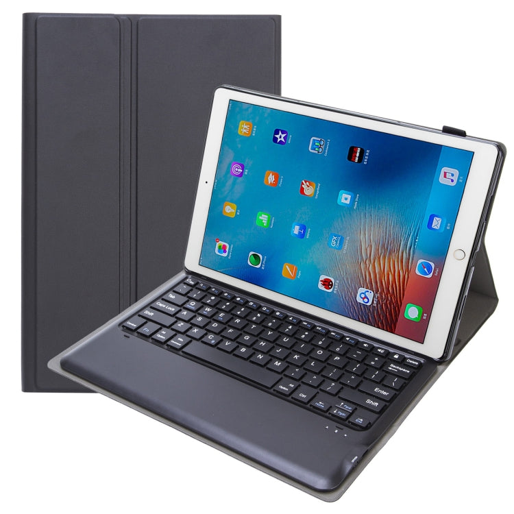 Dark gray leather case with detachable Bluetooth keyboard and stand, viewing angle open