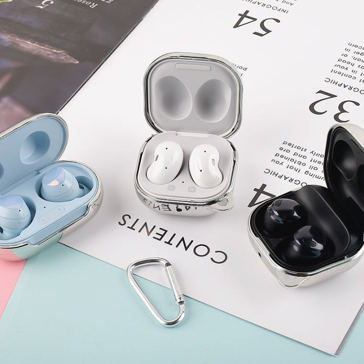 Open silver earphone protective case with white wireless earbuds and carabiner