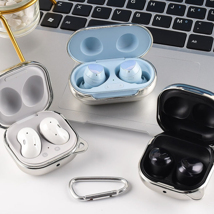 Multiple earphone protective cases in blue, white, and black with carabiners