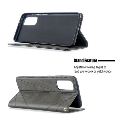 Grey leather wallet phone case with fold-out viewing stand and phone cutout