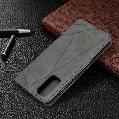 Grey leather phone case with geometric rhombus pattern and side cutout