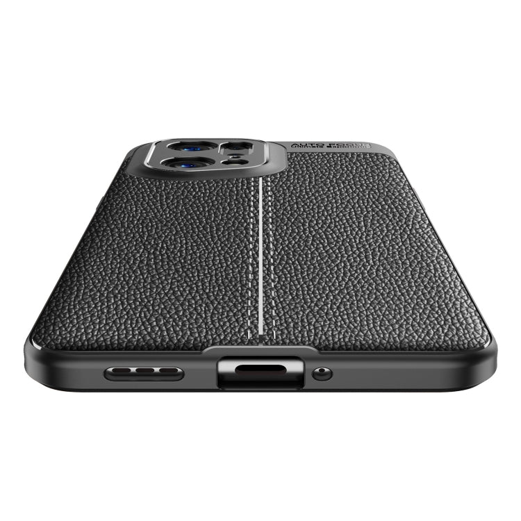 Black TPU phone case bottom view with speaker and charging port openings