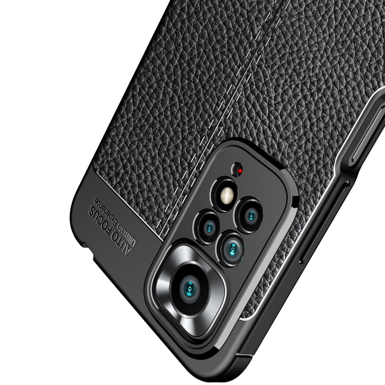 Black litchi-textured TPU phone case with protective camera ring and button cutouts
