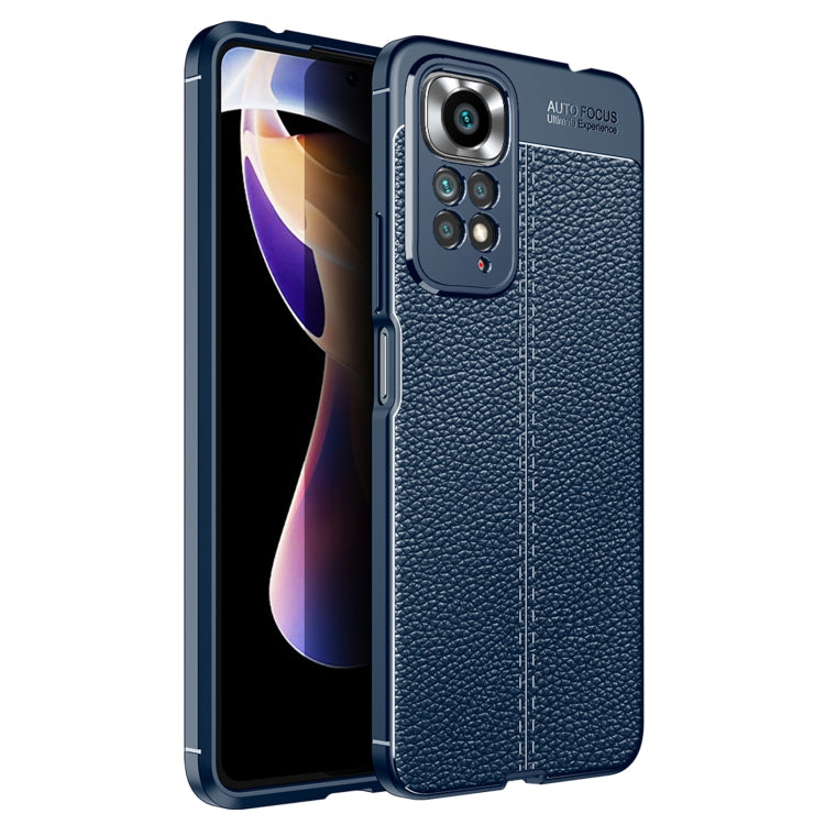 Blue litchi-textured shockproof TPU phone case with camera cutout and raised edges