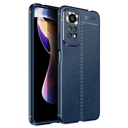 Blue litchi-textured shockproof TPU phone case with camera cutout and raised edges