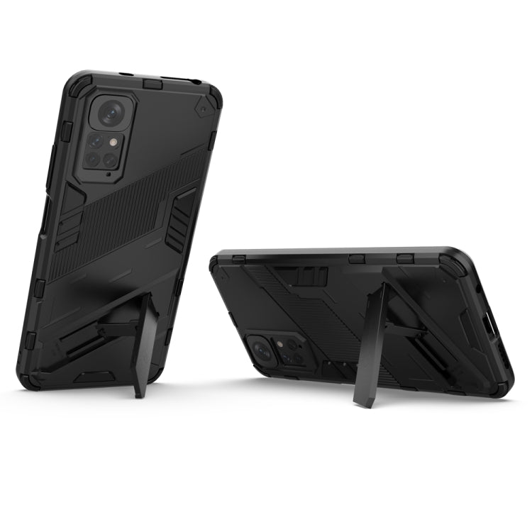 Rugged black phone case with fold-out kickstand and camera cutouts