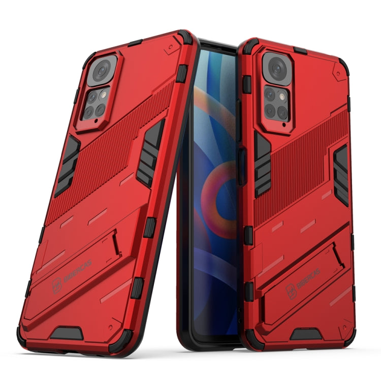 Rugged red phone case with raised corners and camera cutouts