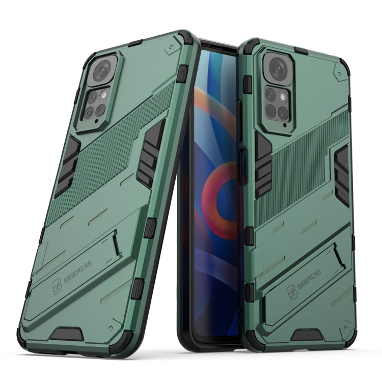 Rugged green phone case with raised corners and camera cutouts
