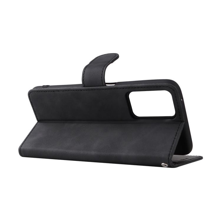 Black leather folio phone case with magnetic buckle, stand view and cutout window