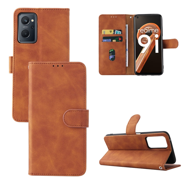 Brown leather folio phone case with magnetic buckle, camera cutout, and stand support