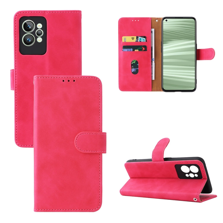 Rose red leather folio phone case with magnetic buckle, camera cutout, and stand