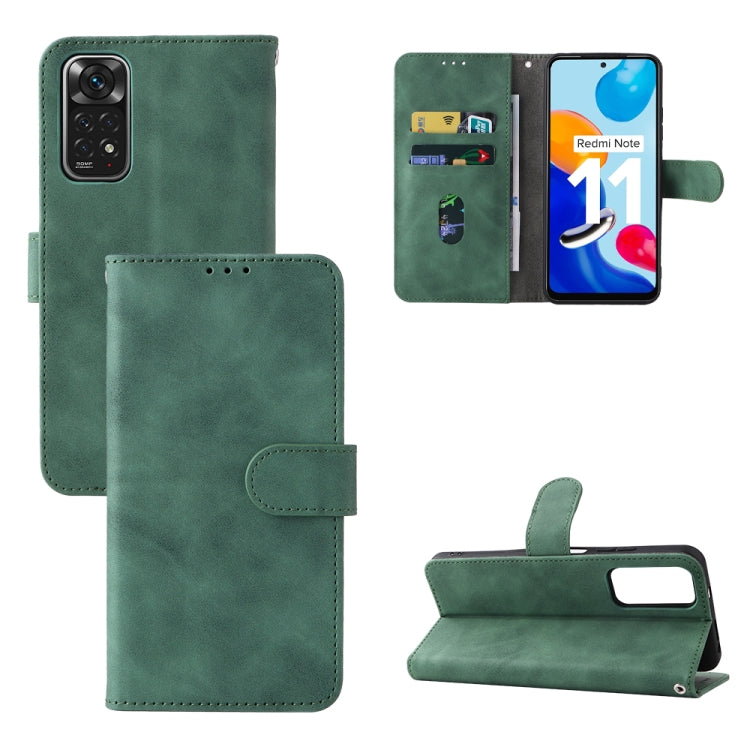 Dark green leather folio phone case with magnetic buckle, camera cutout, and kickstand