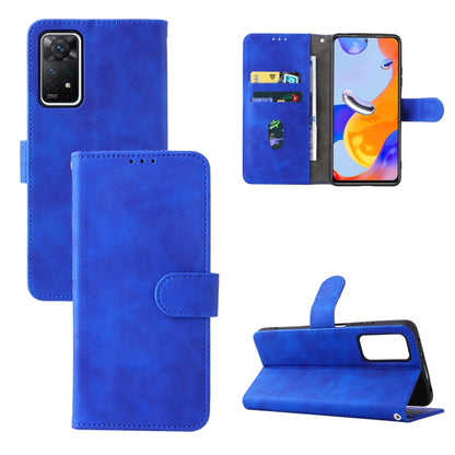 Blue leather magnetic buckle phone case with folio flap and card slots, kickstand