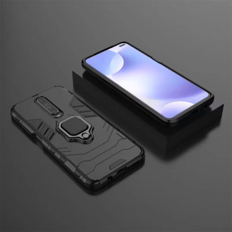 Rugged black protective phone case with magnetic ring holder, visible camera cutout and raised edges