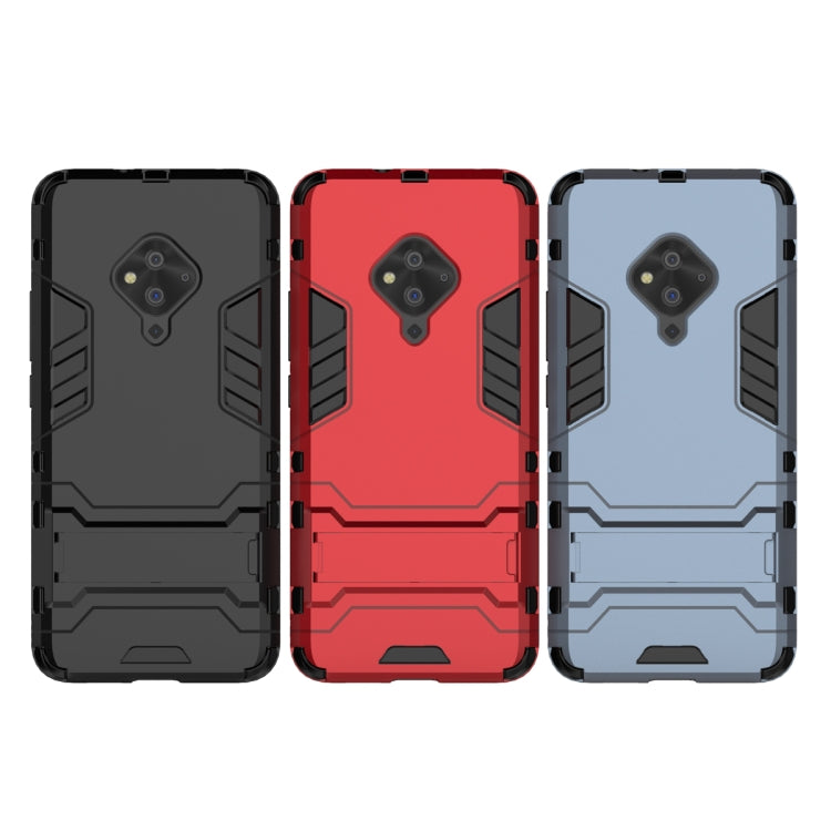 Rugged shockproof phone cases in black, red, and blue-gray with camera cutouts