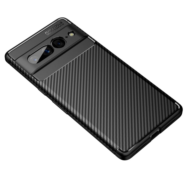 Black carbon fiber pattern TPU phone case, angled view showing back texture and camera area.