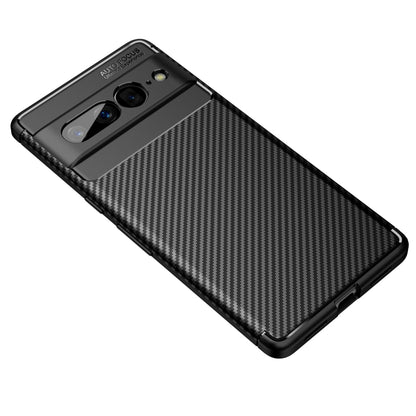 Black carbon fiber pattern TPU phone case, angled view showing back texture and camera area.