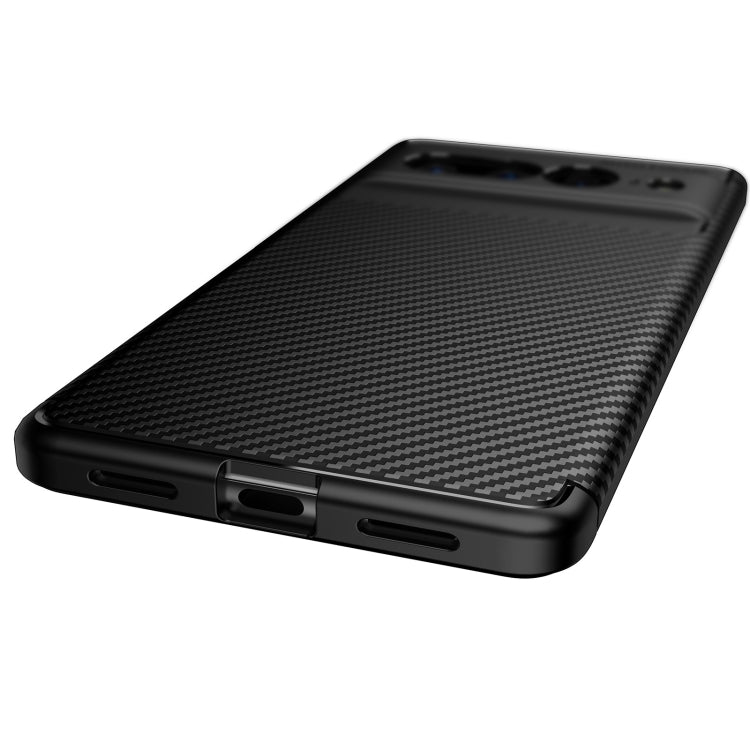 Black carbon fiber style TPU phone case showing side buttons and port cutouts.