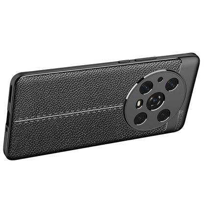 Black textured TPU phone case with raised camera ring and side cutouts