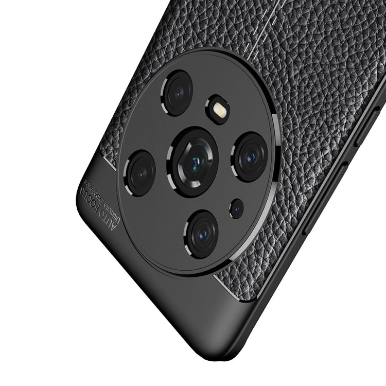 Black textured TPU phone case with camera module cover and grip texture