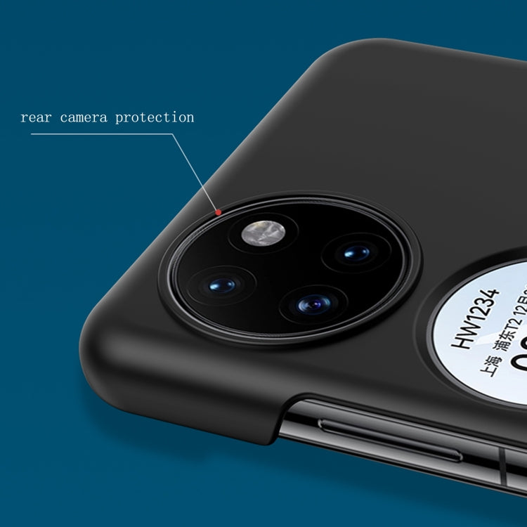 Black oil-sprayed PC phone case close-up showing raised camera protection and speaker cutout.