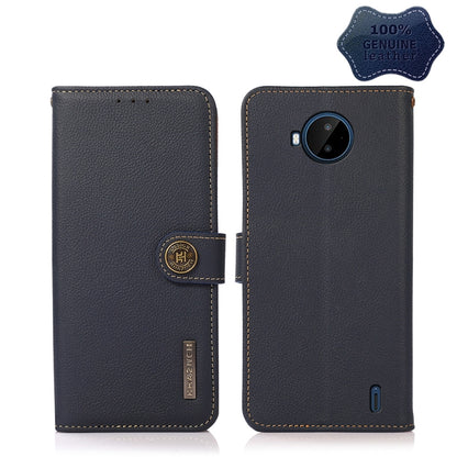 Dark blue genuine leather RFID phone case with magnetic strap and camera cutout