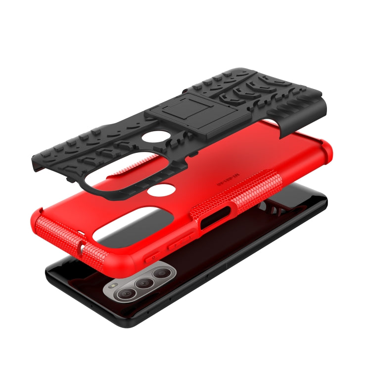 Red rugged phone case with tire tread texture and protective openings for phone buttons