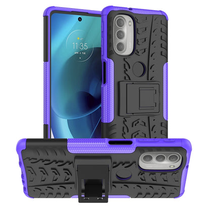 Blue and black rugged phone case with tire tread texture and raised camera and screen edges