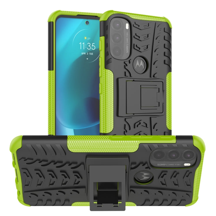 Rugged green phone case with tire tread texture and built-in kickstand holder